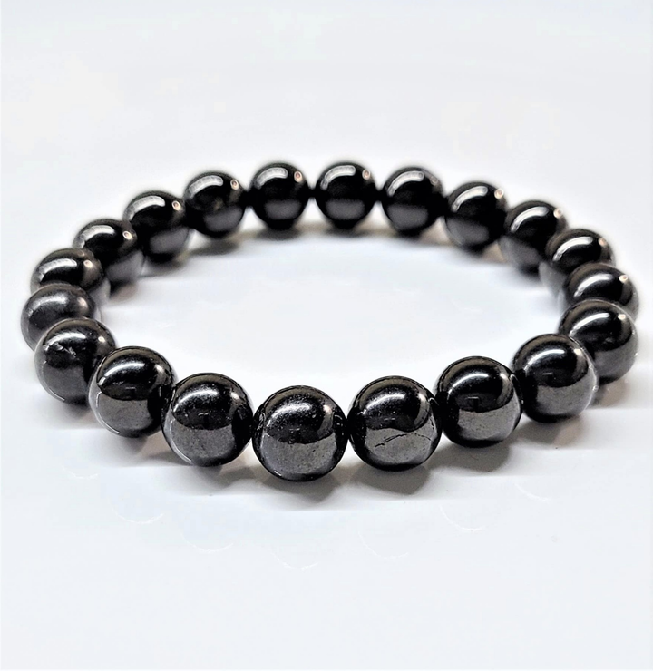 Jet stackable bracelet with round polished black beads for protection and grounding