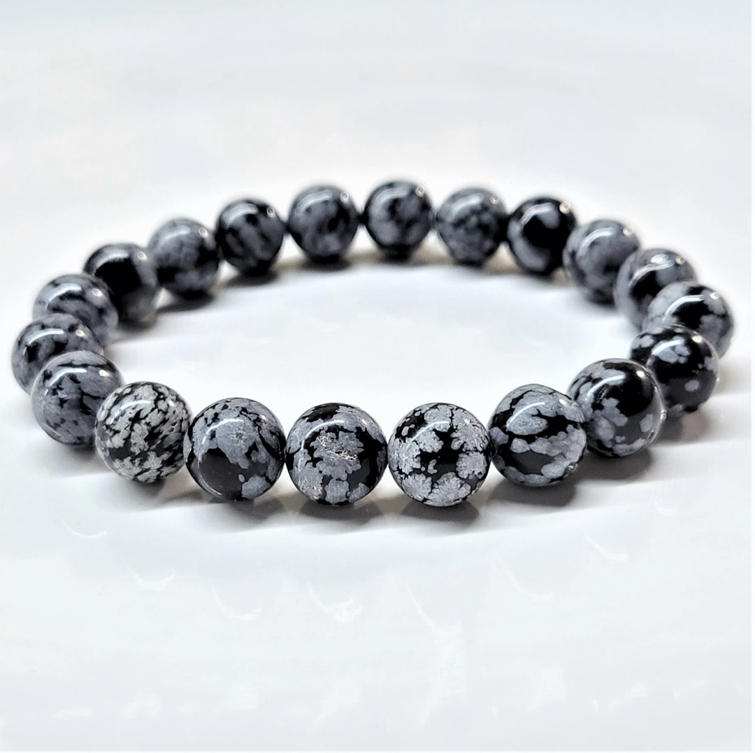 Snowflake Obsidian round bead stackable bracelet with black and white snowflake patterns for grounding and protection