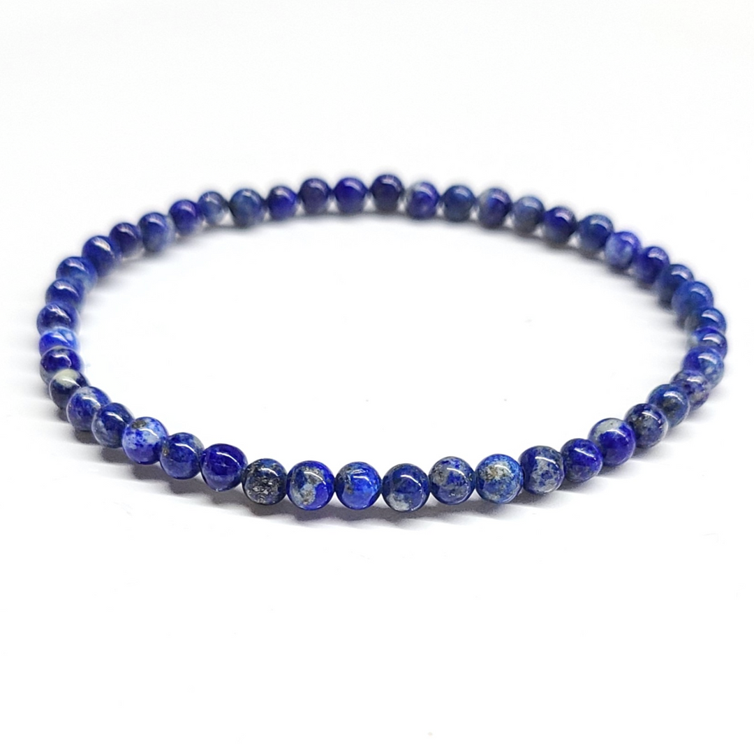 Lapis Lazuli Bracelet 4mm with vibrant blue beads featuring gold pyrite flecks, enhancing spiritual awareness and emotional balance.