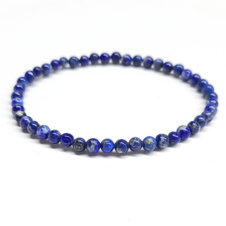 Lapis Lazuli Bracelet 4mm with vibrant blue beads featuring gold pyrite flecks, enhancing spiritual awareness and emotional balance.