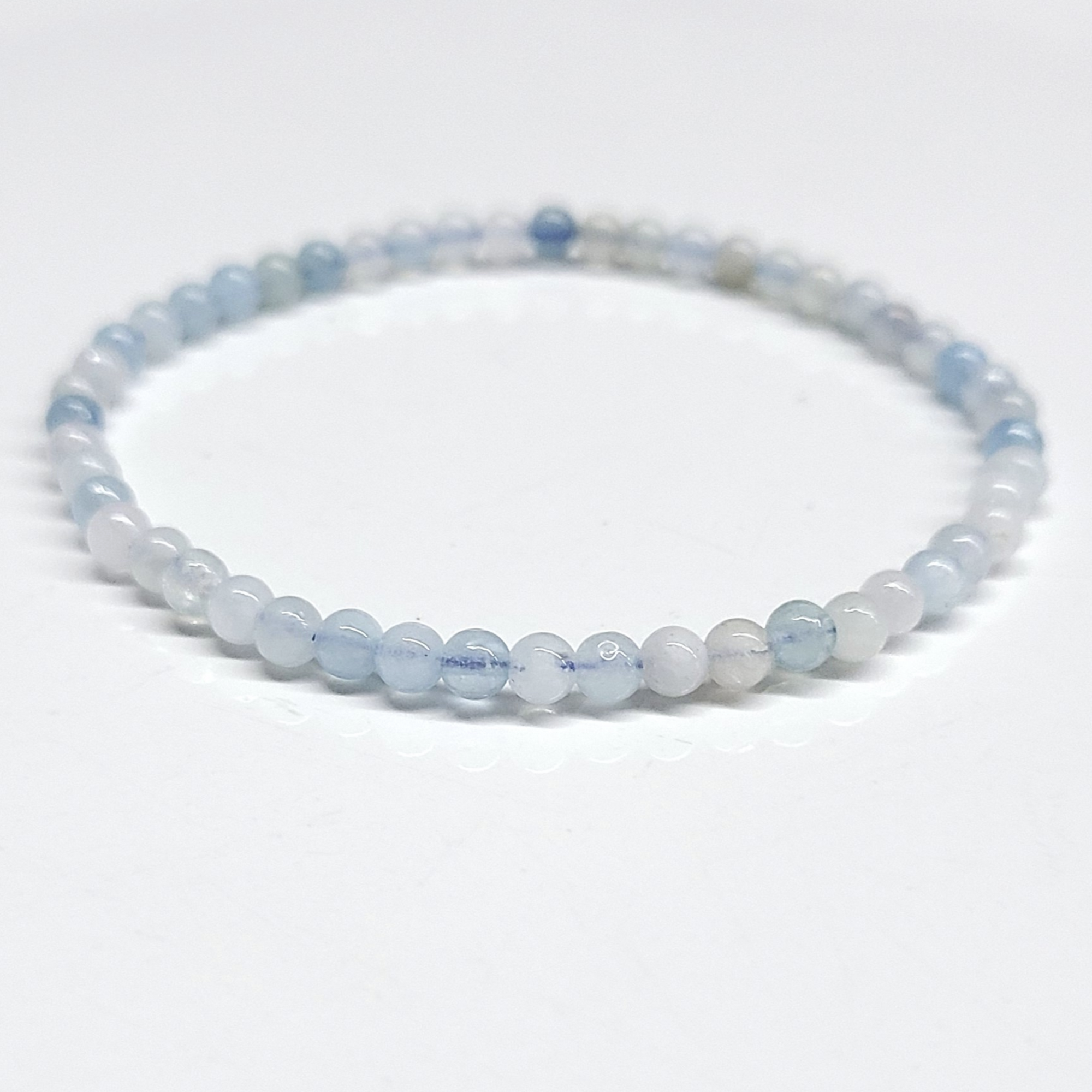 Aquamarine stackable bracelet with 4mm blue beads.