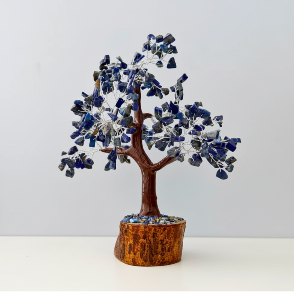 Decorative tree made of stones on a white surface with a neutral background