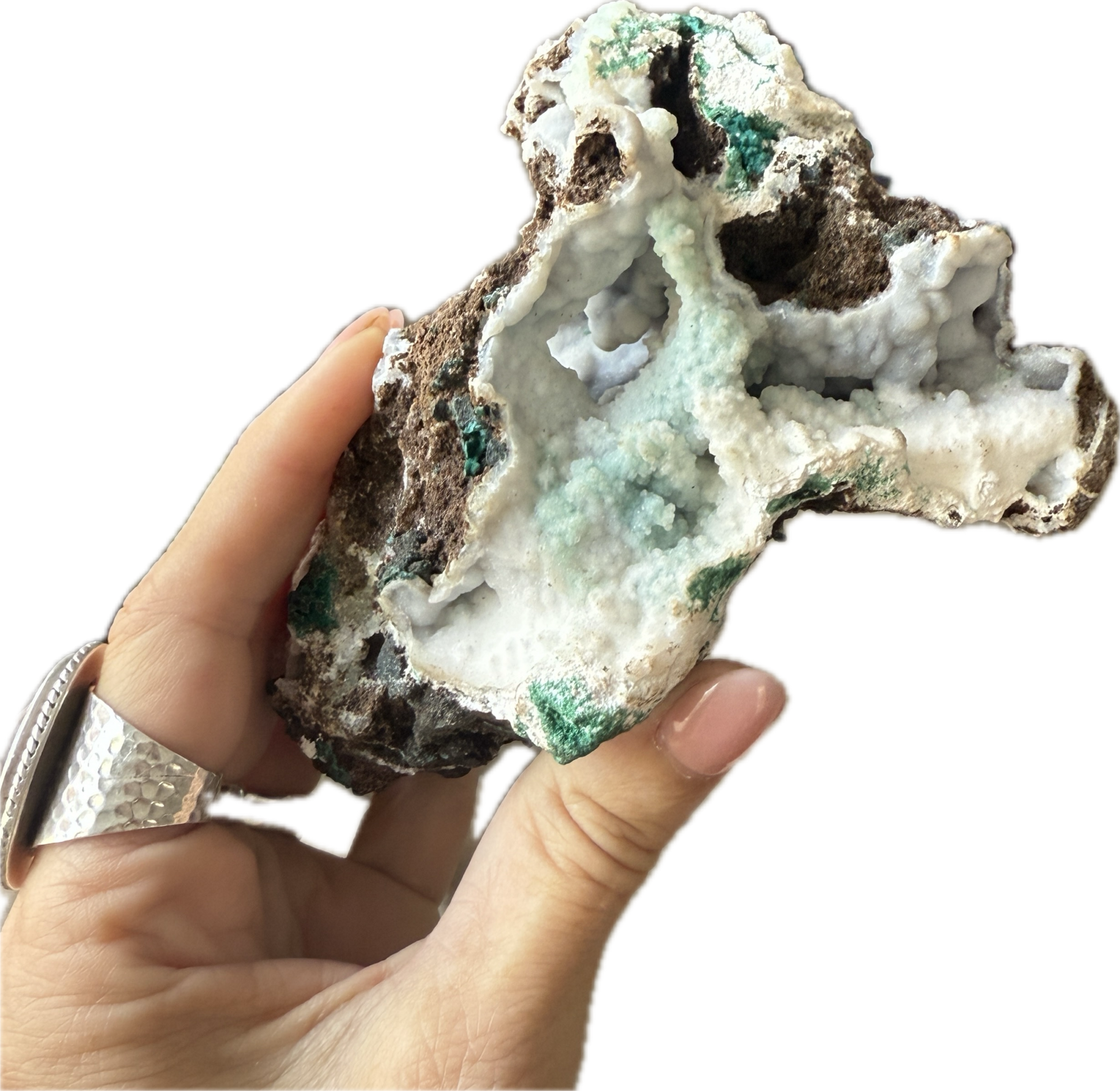 Chrysocolla Malachite in Chalcedony Geode held in hand, showcasing its unique texture and vibrant colors.