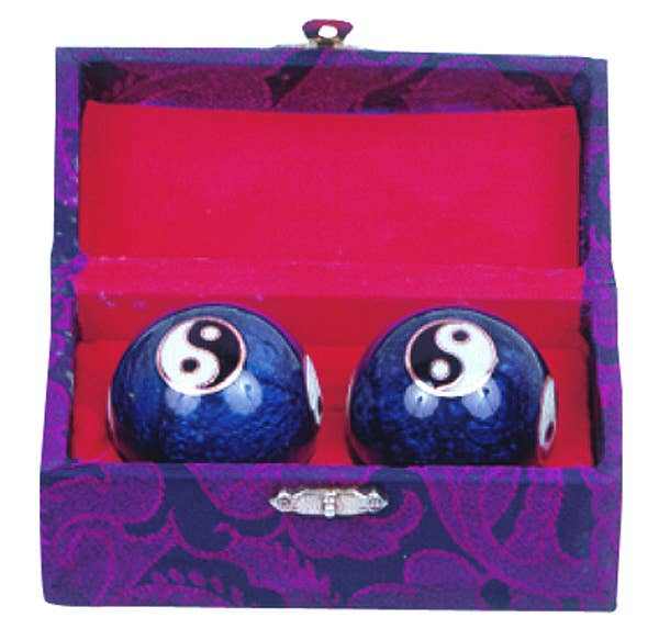 Yin Yang Therapy Balls in decorative box for relaxation and focus.