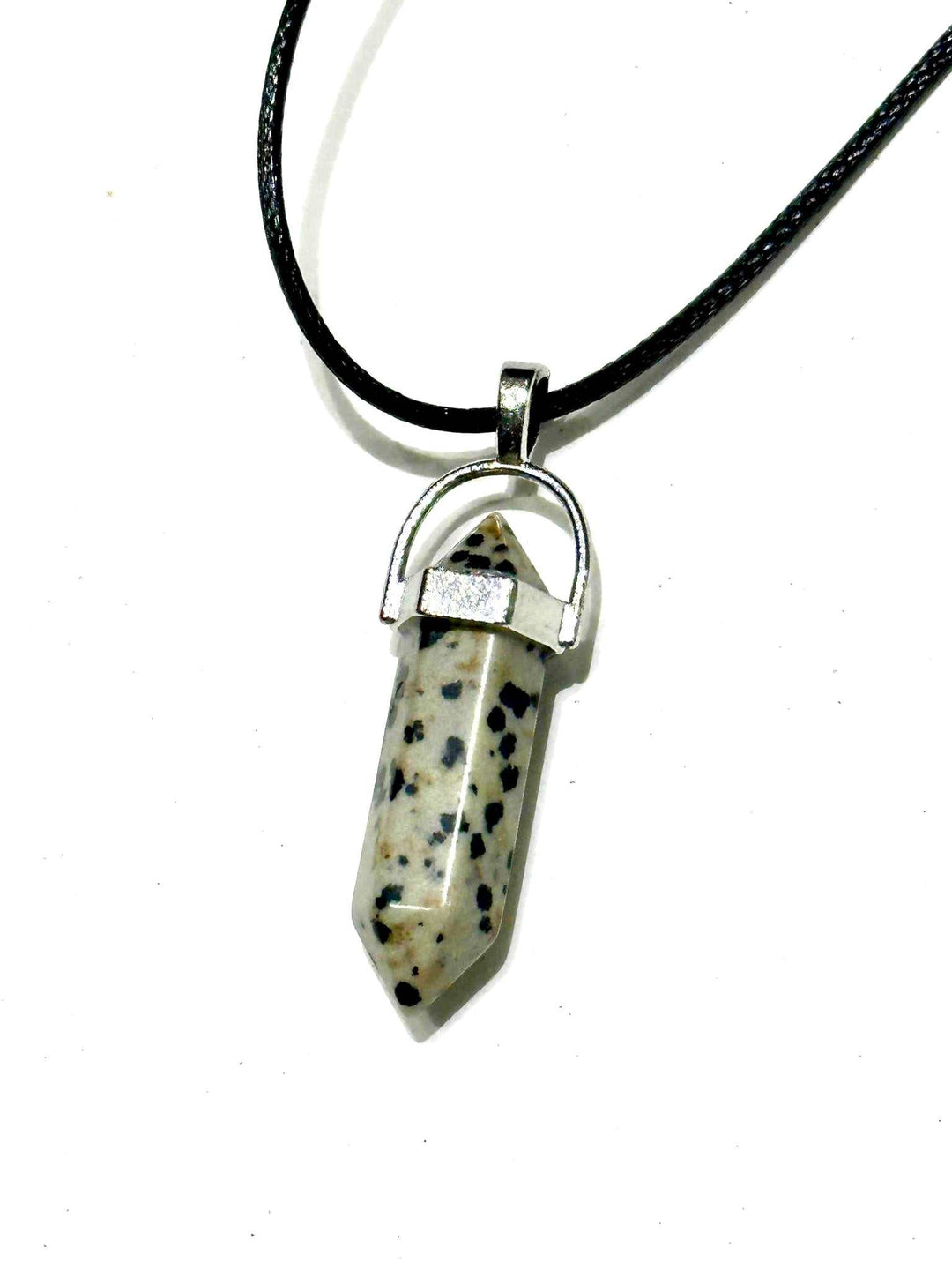 Dalmatian Jasper Bullet Point Necklace with spotted stone pendant and black cord.