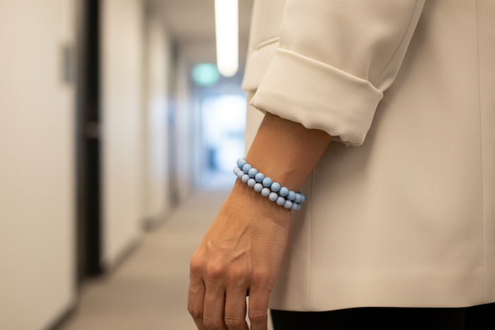 Blue Coral stacked with Angelite - Puerto Rican woman in modern office hallway
