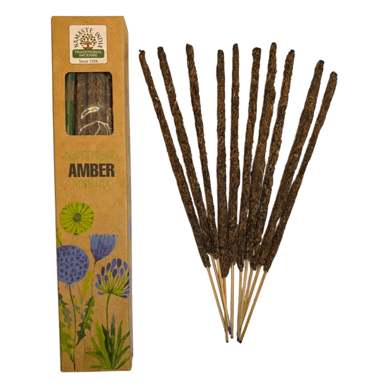Incense sticks with a cardboard box labeled 'Amber' featuring floral designs.