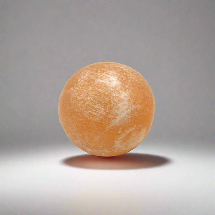 Round orange object on a white background