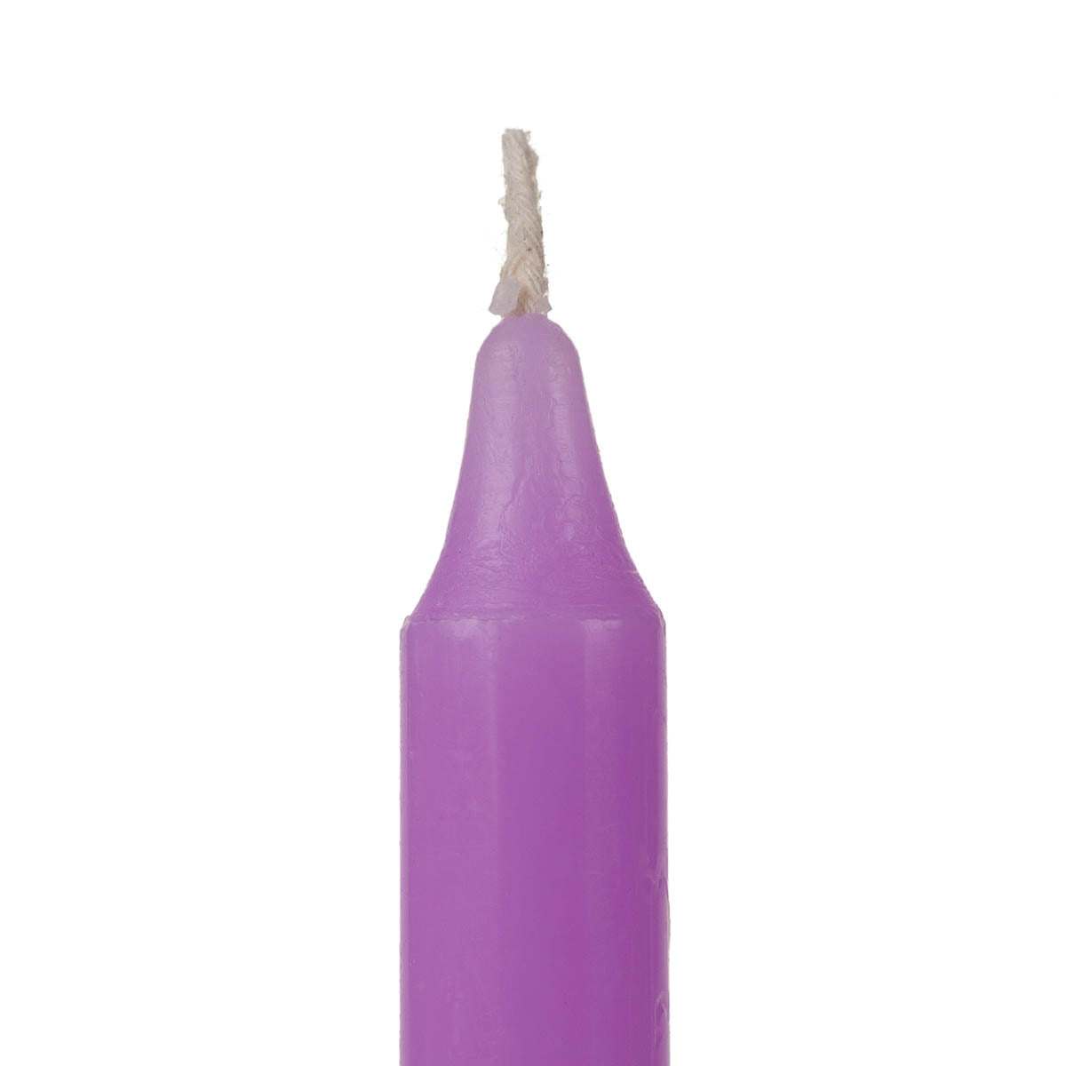 Purple candle with a white wick on a white background