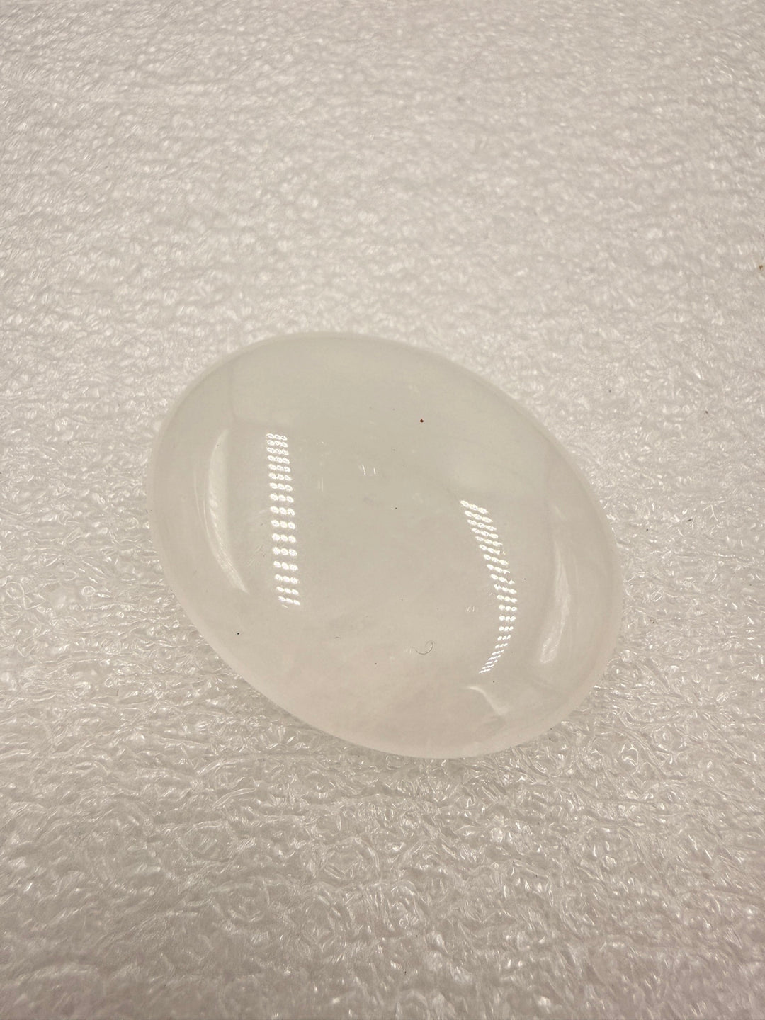 Clear quartz comfort stone showing its translucence