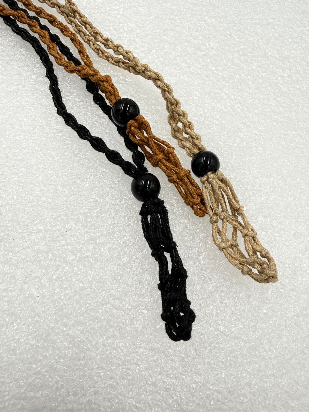 Crystal net necklaces in tan, brown and black cord