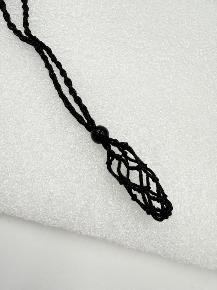Black cord crystal net necklace, close-up of the net