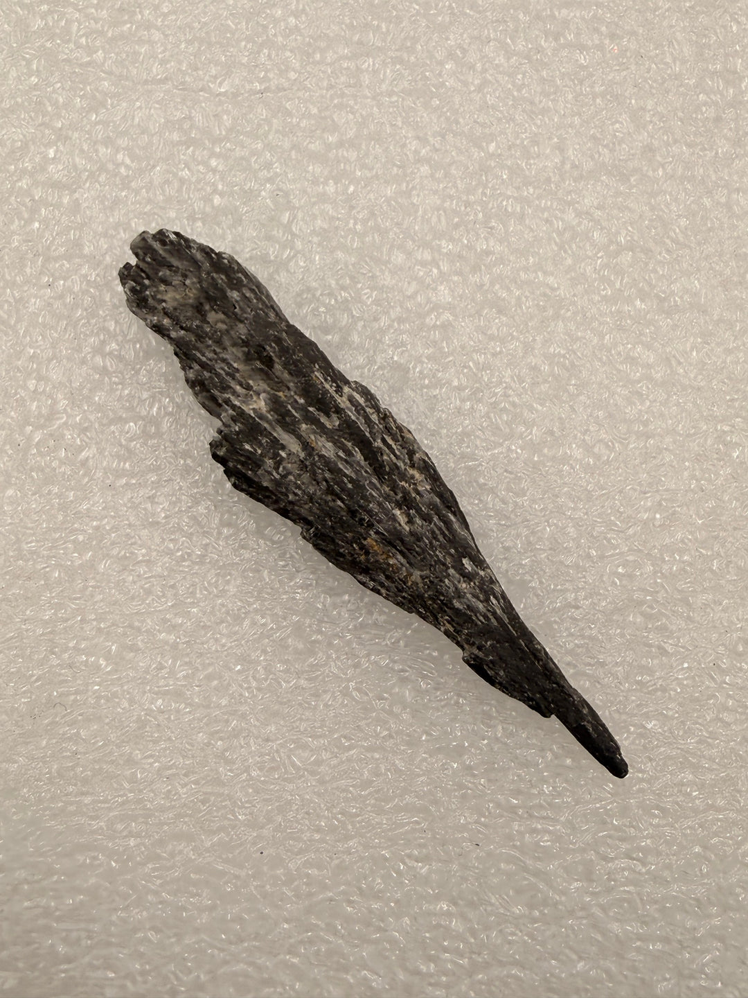 Black kyanite blade, single piece close-up
