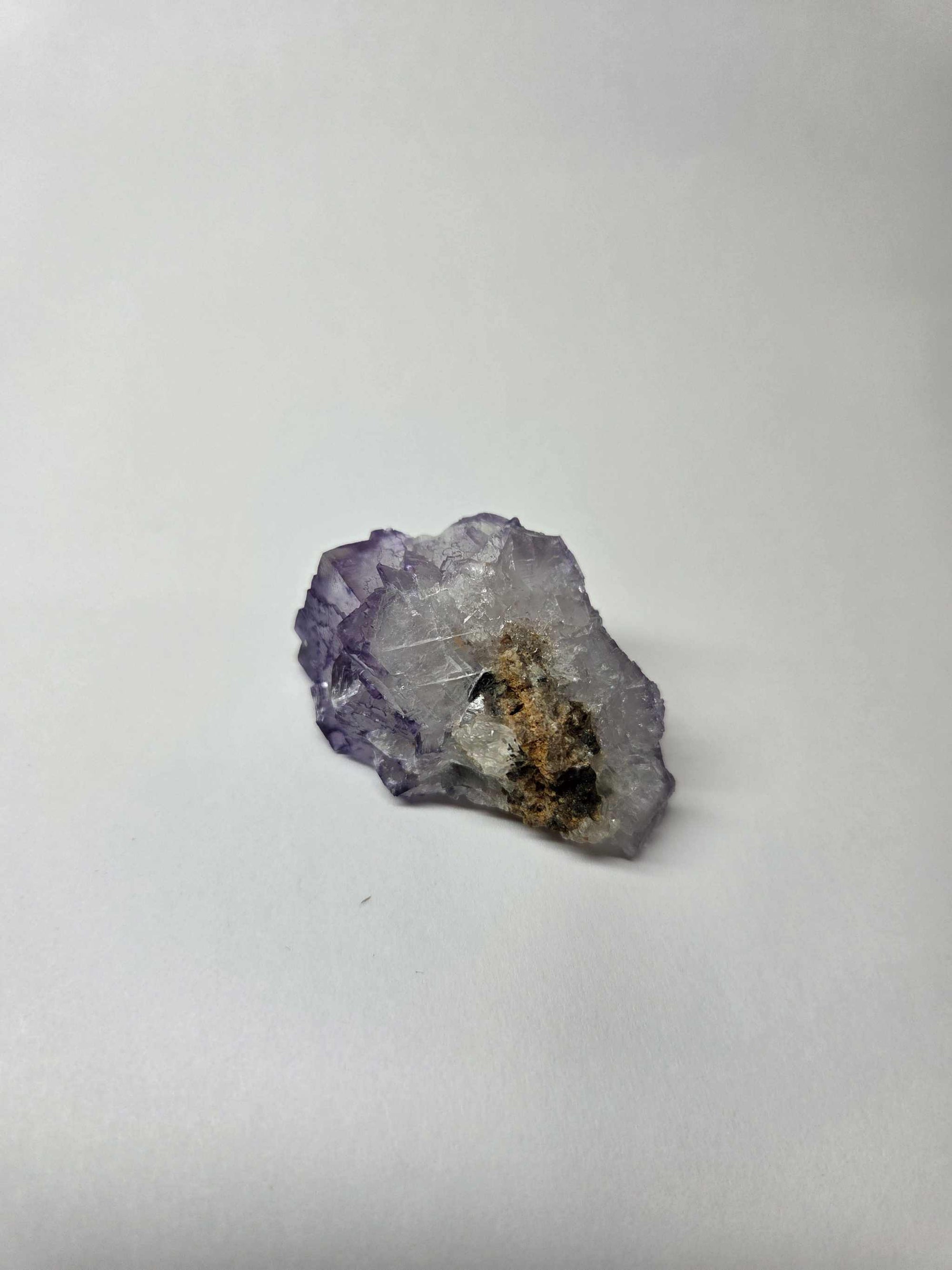 Small Purple Fluorite Specimen with lavender hues and natural crystal formations for spiritual clarity and third eye support