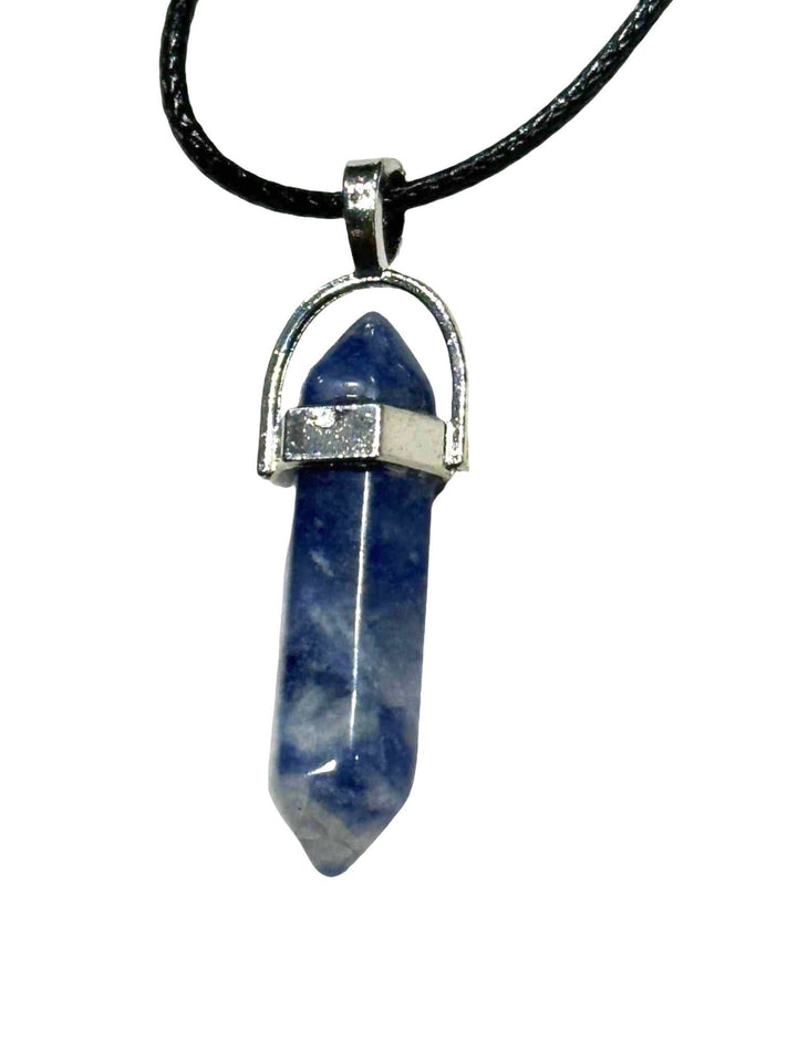 Sodalite Bullet Point Necklace with deep blue stone and silver setting, promotes stress relief and mental clarity.